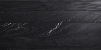 The primary subject of the image is a black marble countertop. The setting is a kitchen, with the countertop being the main focus of the scene. The visual style is a close-up of the marble countertop, showcasing its texture and pattern. The colors and mood of the image are dark and sophisticated, with the black marble countertop being the dominant feature.