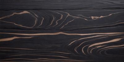The primary subject of the image is a wooden surface with a unique and intricate pattern. The setting is a dark room, and the visual style appears to be a close-up of the wooden surface. The colors and mood of the image are predominantly dark, with the wooden surface being the main focus.