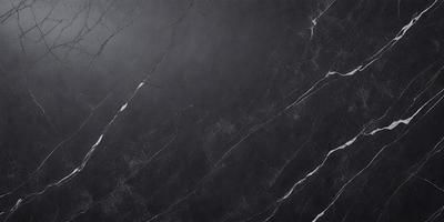The primary subject of the image is a black marble countertop. The setting is a kitchen, with the countertop being the main focus of the scene. The visual style is a close-up of the marble countertop, showcasing its texture and details. The colors and mood of the image are predominantly dark, with the black marble countertop being the main source of contrast and visual interest.