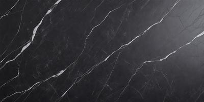 The primary subject of the image is a black marble countertop. The setting is a kitchen, with the countertop being the main focus of the scene. The visual style is a close-up of the marble countertop, showcasing its texture and pattern. The colors and mood of the image are predominantly dark, with the black marble countertop being the main source of contrast.