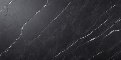 The primary subject of the image is a marble countertop. The setting is a kitchen, with the countertop being the main focus of the scene. The visual style is a photo, capturing the natural texture and beauty of the marble surface. The colors and mood of the image are predominantly black and white, giving it a classic and elegant appearance.