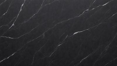 The primary subject of the image is a marble countertop. The setting is a kitchen, with the countertop being the main focus of the scene. The visual style is a close-up of the marble countertop, showcasing its texture and pattern. The colors and mood of the image are predominantly black, giving it a sleek and modern appearance.