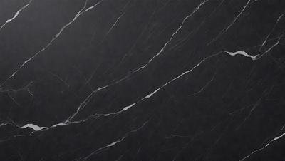 The primary subject of the image is a black marble countertop. The setting is a kitchen, with the countertop being the main focus of the scene. The visual style is a close-up of the marble countertop, showcasing its texture and pattern. The colors and mood of the image are dark and moody, with the black marble countertop being the dominant color.