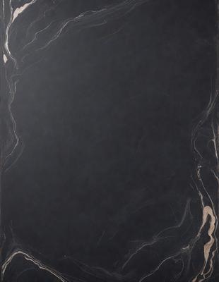 The primary subject of the image is a black marble table. The setting is a dark room, and the visual style is a close-up of the table. The colors and mood of the image are predominantly dark, with the black marble table being the main focus.