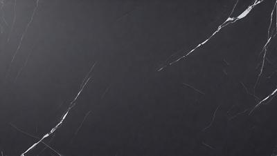 The primary subject of the image is a black wall with white streaks. The setting is a dark room, and the visual style appears to be a photo. The dominant colors are black and white, creating a moody atmosphere.