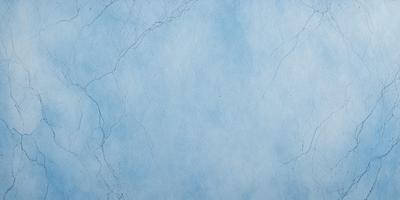 The primary subject of the image is a blue wall with a white background. The visual style appears to be a photo, as it captures the blue and white color scheme of the wall. The colors and mood of the image are predominantly blue and white, creating a calm and serene atmosphere.