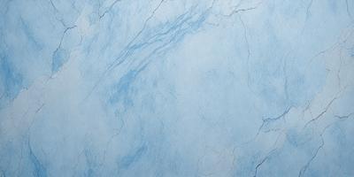 The primary subject of the image is a blue marble wall. The setting is a room with a blue marble wall, and the visual style is a photo. The dominant colors are blue and white, creating a calm and serene atmosphere.