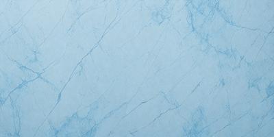 The primary subject of the image is a blue marble wall with a white background. The visual style appears to be a photo, and the colors and mood are predominantly blue and white, creating a clean and serene atmosphere.