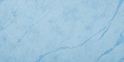 The primary subject of the image is a blue marble wall with a white and blue pattern. The setting is a room with a blue and white marble wall, which serves as the background. The visual style is a photo, capturing the intricate details of the marble wall. The colors and mood of the image are predominantly blue and white, creating a calm and serene atmosphere.