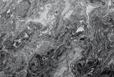 The image features a black and white marble pattern, which gives it a classic and elegant appearance. The marble pattern is the primary subject of the image, and it is set against a gray background. The visual style of the image is a close-up of the marble pattern, which highlights its intricate details. The colors and mood of the image are predominantly black and white, creating a timeless and sophisticated atmosphere.
