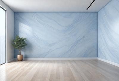 The primary subject of the image is a large blue marble wall. The setting is a room with a wooden floor, and the visual style is a photo. The dominant colors are blue and white, creating a calm and serene atmosphere.