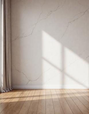 The primary subject of the image is a marble wall with a window in the background. The setting is a room with a wooden floor. The visual style is a photo, and the colors and mood are predominantly white, giving the room a clean and minimalist appearance.