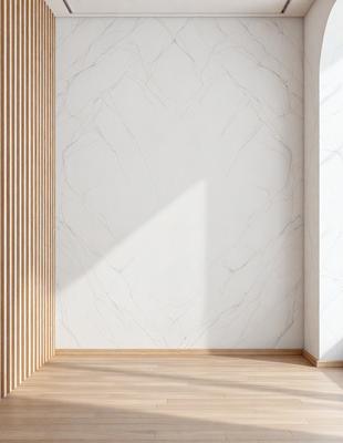 The primary subject of the image is a white marble wall. The setting is a room with a wooden floor. The visual style is a photo, and the colors and mood are predominantly white, giving the room a clean and minimalist appearance.