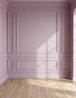 The primary subject of the image is a white wall with a pink border. The setting is a room with a wooden floor. The visual style is a photo, and the colors and mood are predominantly white and pink, creating a clean and elegant atmosphere.