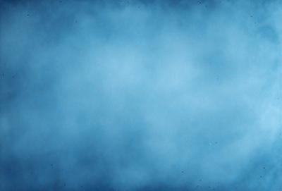 The primary subject of the image is a blue sky with clouds. The setting is a cloudy day, and the visual style is a photo. The dominant colors are blue and white, creating a calm and serene atmosphere.