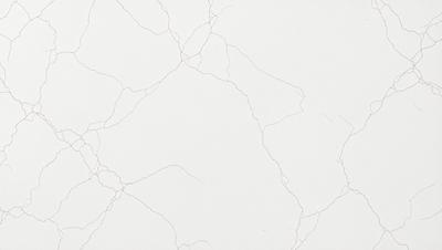 The primary subject of the image is a white marble wall with a cracked and textured surface. The setting is a room with a white background, and the visual style is a close-up of the marble wall. The colors and mood of the image are predominantly white, giving it a clean and minimalist appearance.