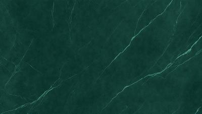 The primary subject of the image is a green marble countertop. The setting is a kitchen, with the countertop being the main focus of the scene. The visual style is a photo, capturing the natural texture and color of the marble. The dominant colors are green and white, creating a calm and soothing atmosphere.
