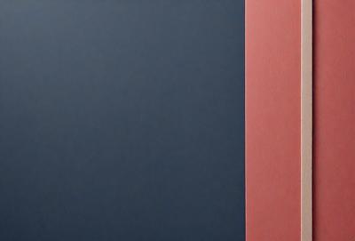 The primary subject of the image is a blue wall. The setting is a room with a red wall, which is visible in the background. The visual style is a photo, and the dominant colors are blue and red. The overall atmosphere of the image is calm and serene.