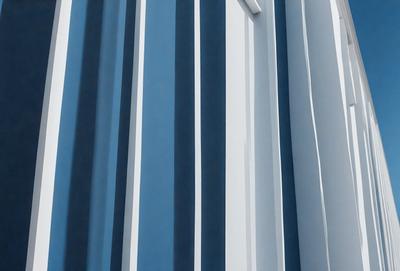 The primary subject of the image is a blue and white striped wall. The setting is a white wall with blue stripes, and the visual style is a photo. The colors and mood of the image are predominantly blue and white, creating a clean and modern atmosphere.