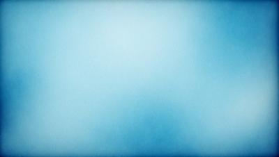 The primary subject of the image is a large, empty blue sky. The setting is a vast, open space with no visible landmarks or objects. The visual style is a realistic representation of the sky, with no indication of digital art or illustration. The colors and mood of the image are predominantly blue, creating a calm and serene atmosphere.