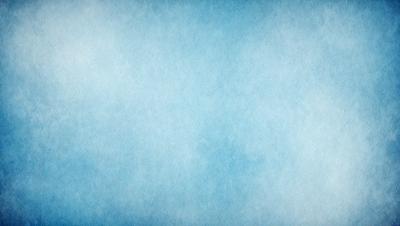 The primary subject of the image is a large, blue, textured surface. The setting is a cloudy sky, which serves as the backdrop for the scene. The visual style of the image is a combination of a photo and a digital art, creating a unique and interesting atmosphere. The dominant colors in the image are blue and white, giving the scene a calm and serene mood.