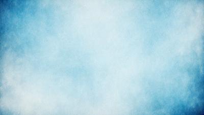 The primary subject of the image is a large, empty, and cloudy blue sky. The setting is a vast, open space with no visible landmarks or objects. The visual style is a realistic representation of the sky, with no indication of digital art or illustration. The colors and mood of the image are predominantly blue, creating a calm and serene atmosphere.