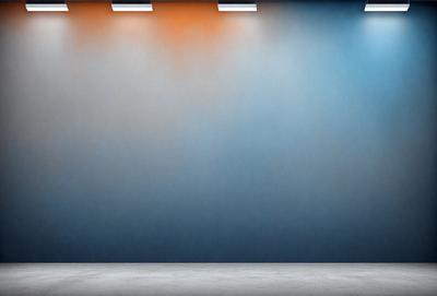 The primary subject of the image is a large, empty room with a blue and orange painted wall. The setting is a stage or a room with a blue and orange painted wall. The visual style is a photo, and the colors and mood are vibrant and energetic.