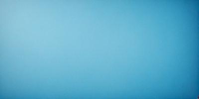 The primary subject of the image is a large, empty blue canvas. The setting is a blue background, which creates a sense of depth and space. The visual style is a simple, clean, and minimalist design. The colors and mood are predominantly blue, which gives the image a calm and serene atmosphere.