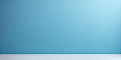 The primary subject of the image is a blue wall. The setting is a white background, which provides a clean and minimalist appearance. The visual style is a photo, capturing the blue wall in its natural environment. The colors and mood of the image are predominantly blue, creating a calm and serene atmosphere.