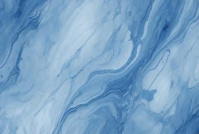 The primary subject of the image is a blue and white marbled surface, which appears to be a tile or a wall. The setting is a room with a blue and white color scheme. The visual style is a close-up of the marbled surface, showcasing its intricate patterns. The colors and mood of the image are predominantly blue and white, creating a calm and serene atmosphere.