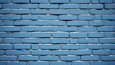 The primary subject of the image is a blue brick wall. The setting is a brick wall, and the visual style is a photo. The dominant colors are blue and white, creating a calm and serene atmosphere.