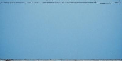 The primary subject of the image is a blue wall with a white border. The setting is a room with a blue background. The visual style is a drawing or illustration, giving the image a more artistic and creative appearance. The dominant colors are blue and white, creating a calm and soothing atmosphere.