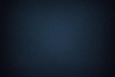 The primary subject of the image is a dark blue sky. The setting is a vast, open space with no visible landmarks or objects. The visual style is a simple, monochromatic image with no additional elements or textures. The colors and mood convey a sense of calmness and tranquility.