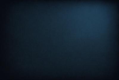 The primary subject of the image is a dark blue background. The setting is a black background, which creates a contrast with the dark blue. The visual style is a simple, monochromatic design. The colors and mood are predominantly dark and moody, with the blue and black creating a sense of depth and mystery.