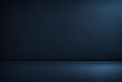 The primary subject of the image is a blue wall. The setting is a dark room, and the visual style is a photo. The dominant colors are blue and black, creating a moody atmosphere.