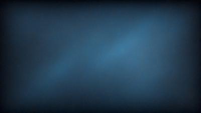 The primary subject of the image is a blue sky with a few clouds. The setting is a dark blue background, which creates a contrasting effect with the sky. The visual style is a photo, capturing the beauty of the sky and clouds. The colors and mood of the image are predominantly dark blue, creating a calm and serene atmosphere.