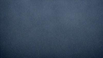 The primary subject of the image is a blue cloth, which is the main object, scene, or focus of the image. The setting or background is a blue cloth, and the visual style is a photo. The dominant colors and overall atmosphere are blue and dark, creating a moody and dramatic scene.