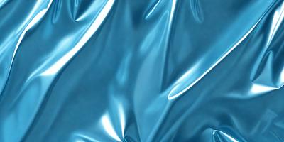 The primary subject of the image is a blue fabric, which appears to be a piece of shiny, metallic-looking material. The setting is a dark background, which contrasts with the blue fabric. The visual style is a close-up of the fabric, showcasing its unique texture and appearance. The colors and mood of the image are predominantly blue, creating a sense of calmness and sophistication.