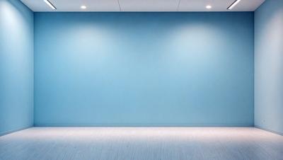 The primary subject of the image is a large, empty room with a blue wall. The setting is a clean, white room with a blue wall, and the visual style is a photo. The room appears to be a large, empty space with a blue wall, and the colors and mood are predominantly blue, creating a calm and serene atmosphere.