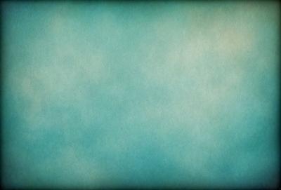The primary subject of the image is a large, blue, cloudy sky. The setting is a vast, open space with no visible landmarks or objects. The visual style is a natural, outdoor scene with a focus on the sky. The colors and mood are predominantly blue, creating a calm and serene atmosphere.