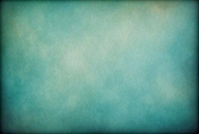 The primary subject of the image is a large, blue, textured surface. The setting is a cloudy sky, which serves as the backdrop for the scene. The visual style of the image is a combination of photo and digital art, creating a unique and intriguing atmosphere. The dominant colors in the image are blue and white, with the blue surface and the cloudy sky providing a sense of depth and tranquility.