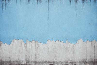 The primary subject of the image is a blue sky with a few clouds. The setting is a blue and white wall, which serves as the backdrop for the sky. The visual style is a combination of a photo and digital art, creating a unique and artistic representation of the sky. The colors and mood of the image are predominantly blue and white, giving it a calm and serene atmosphere.