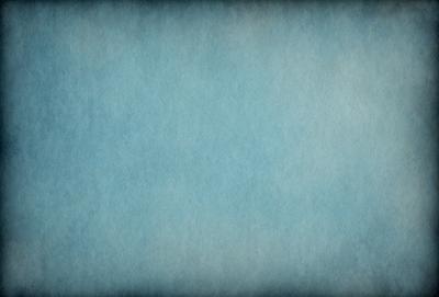 The primary subject of the image is a large, blue, textured surface. The setting is a cloudy sky, which serves as the backdrop for the scene. The visual style of the image is a combination of a photo and a digital art, creating a unique and interesting atmosphere. The dominant colors in the image are blue and white, with the blue surface and the cloudy sky providing a sense of depth and contrast.