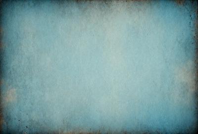The primary subject of the image is a blue background with a texture that resembles a piece of paper. The setting is a large, empty space with no visible objects or people. The visual style is a combination of a photo and a drawing, giving the image a unique and artistic appearance. The colors and mood are predominantly blue, creating a calm and serene atmosphere.
