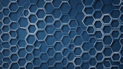 The primary subject of the image is a blue and white patterned wall. The setting is a room with a blue and white tiled wall, which serves as the background. The visual style is a close-up of the tiled wall, showcasing the intricate pattern. The dominant colors are blue and white, creating a calm and soothing atmosphere.