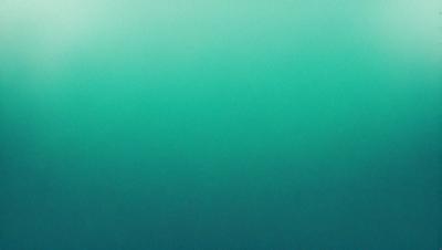 The primary subject of the image is a large body of water, which appears to be a deep blue ocean. The setting is a vast expanse of water, with no visible land or other objects. The visual style of the image is a close-up of the water, showcasing its depth and beauty. The colors and mood of the image are serene and calming, with the deep blue water evoking a sense of tranquility and vastness.