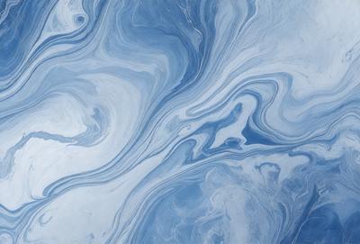 The primary subject of the image is a blue and white ocean wave. The setting is the ocean, with the wave being the main focus of the image. The visual style is a photo of the ocean, capturing the beauty of the wave. The dominant colors are blue and white, creating a serene and calming atmosphere.