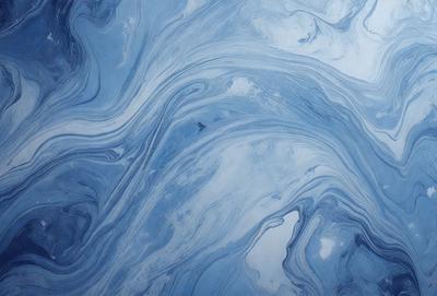 The primary subject of the image is a blue and white ocean wave. The setting is the ocean, with the wave rolling in. The visual style is a photo of the ocean, capturing the beauty of the waves. The dominant colors are blue and white, creating a serene and calming atmosphere.