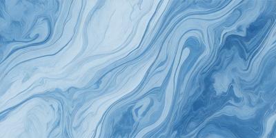 The primary subject of the image is a blue and white swirling pattern, which appears to be a blue and white marble or a blue and white tile. The setting is a blue background, which complements the blue and white pattern. The visual style is a close-up of the pattern, showcasing its intricate details. The colors and mood of the image are predominantly blue and white, creating a sense of calmness and elegance.