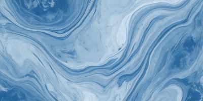 The primary subject of the image is a blue and white ocean wave. The setting is the ocean, with the wave rolling in. The visual style is a photo of the ocean, capturing the beauty of the waves. The dominant colors are blue and white, creating a serene and calming atmosphere.